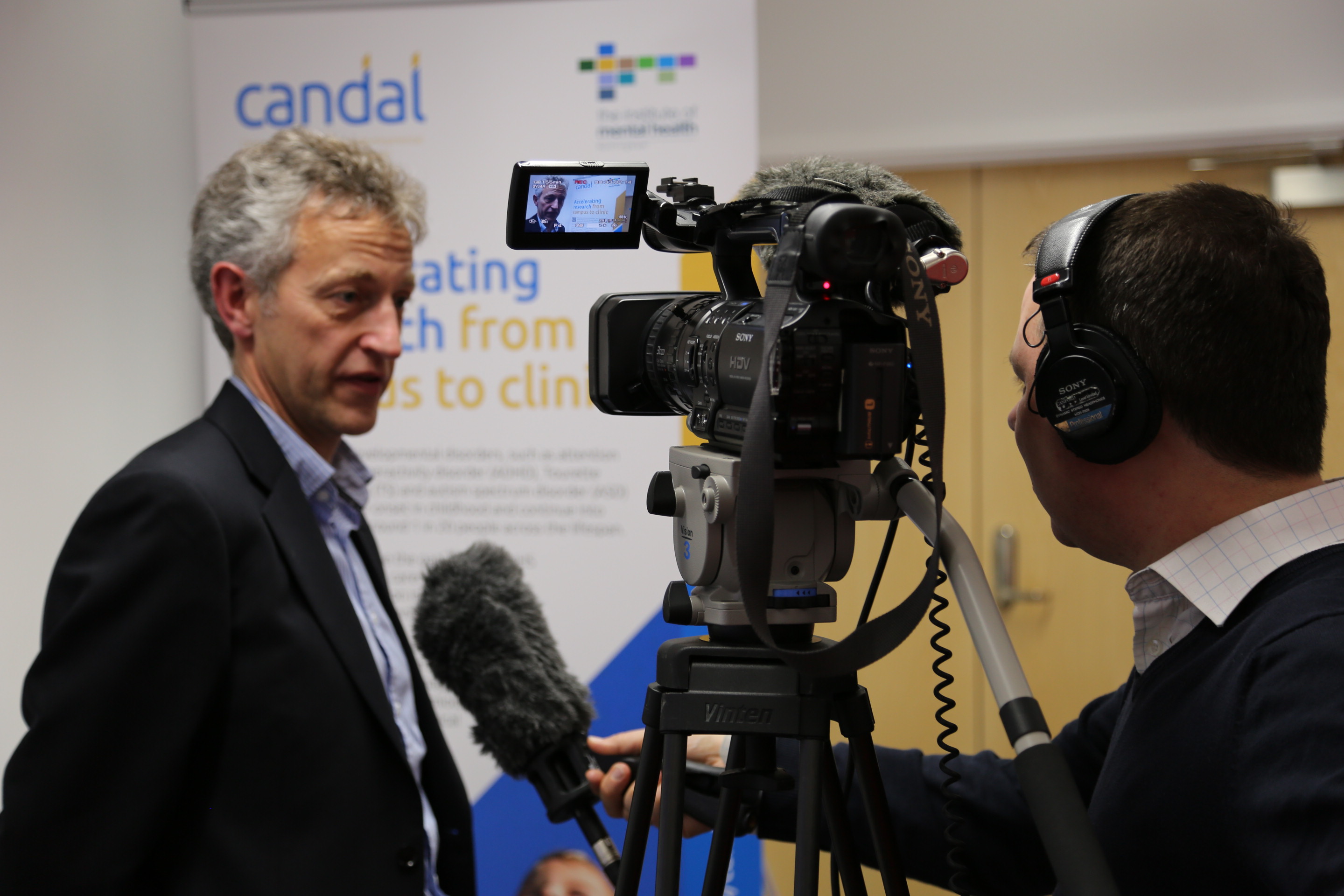 Prof Chris Hollis being interviewed on camera